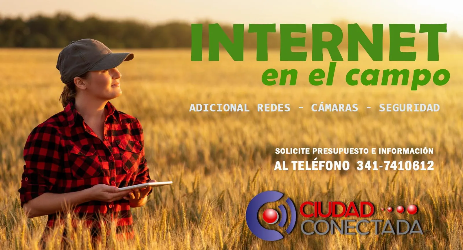 Internet en el campo: persona con tablet en un sembrado